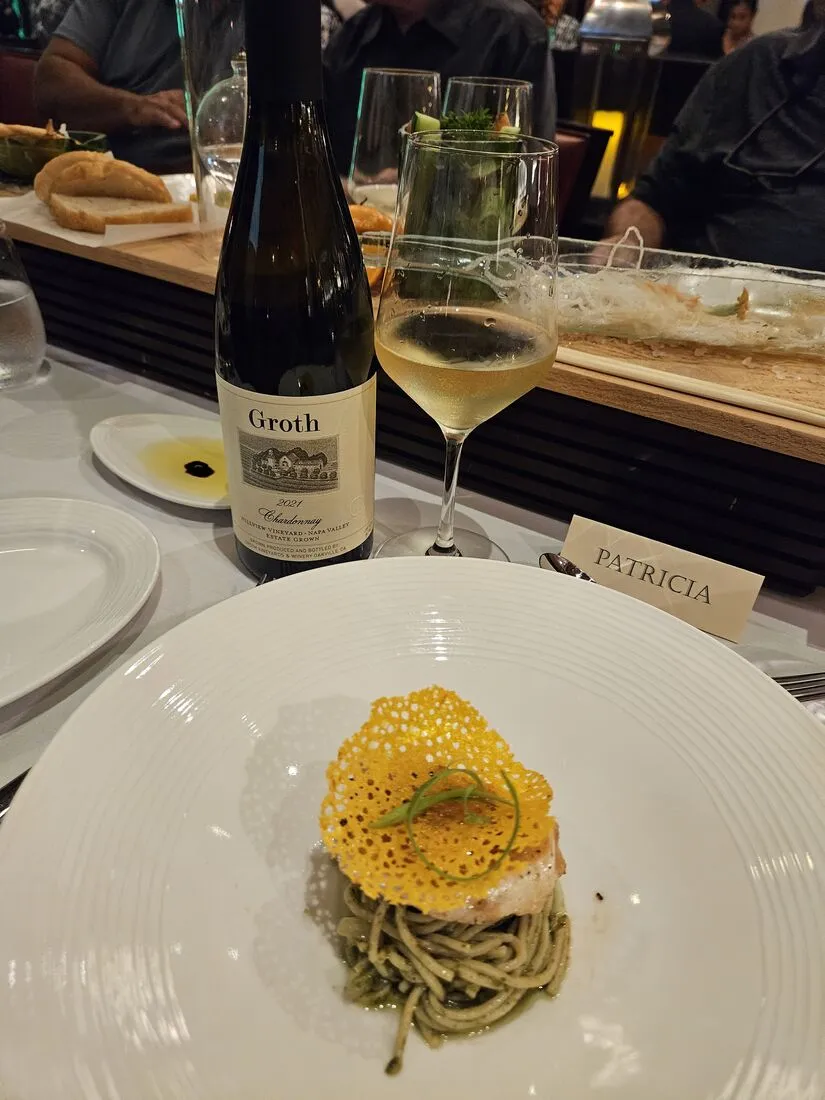 A glass raised at a Guam tasting