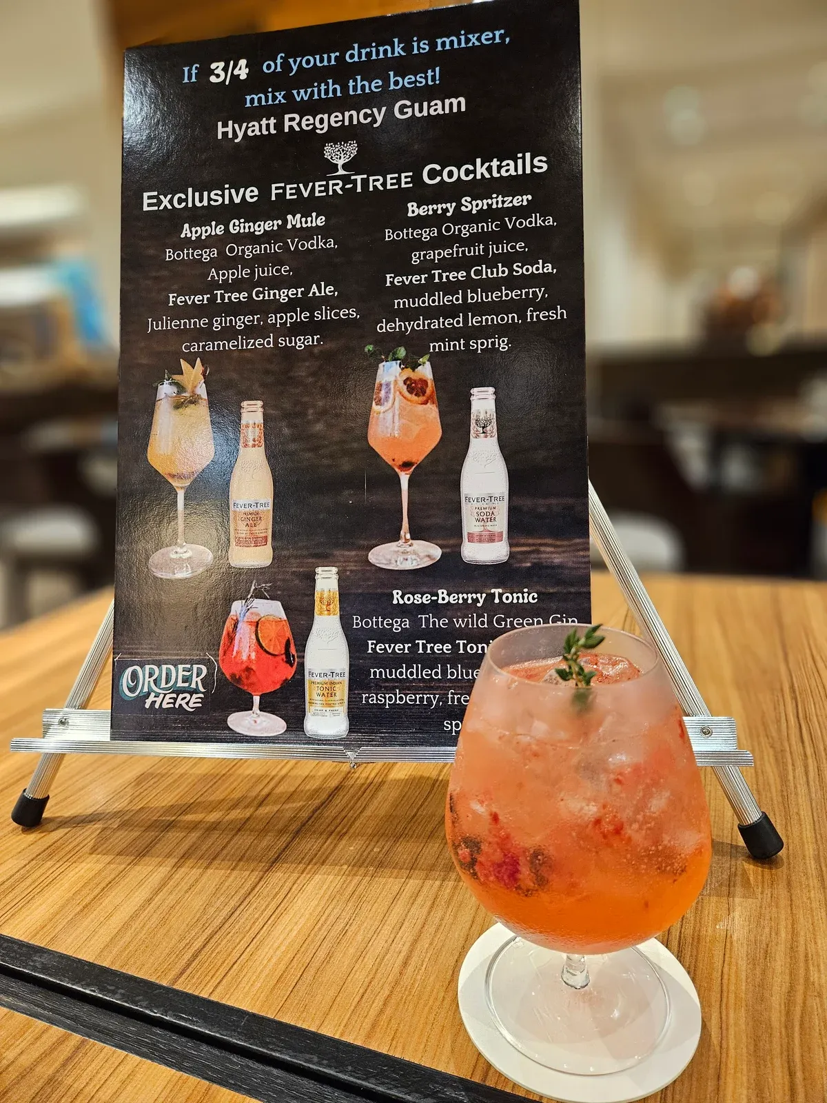 A Fever-Tree cocktail beside the Hyatt’s exclusive Fever-Tree cocktail menu