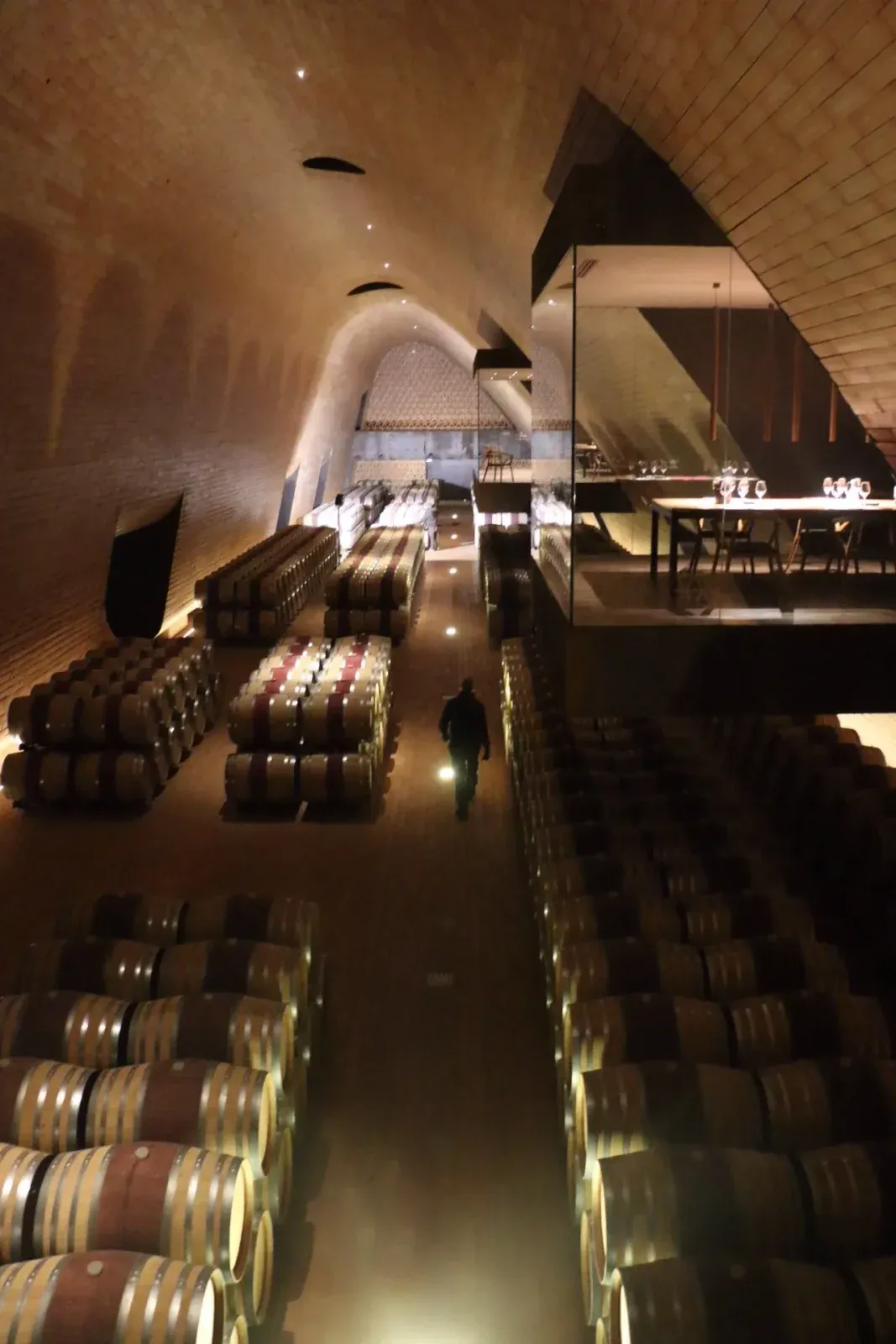 Rows of barrels in an underground cellar