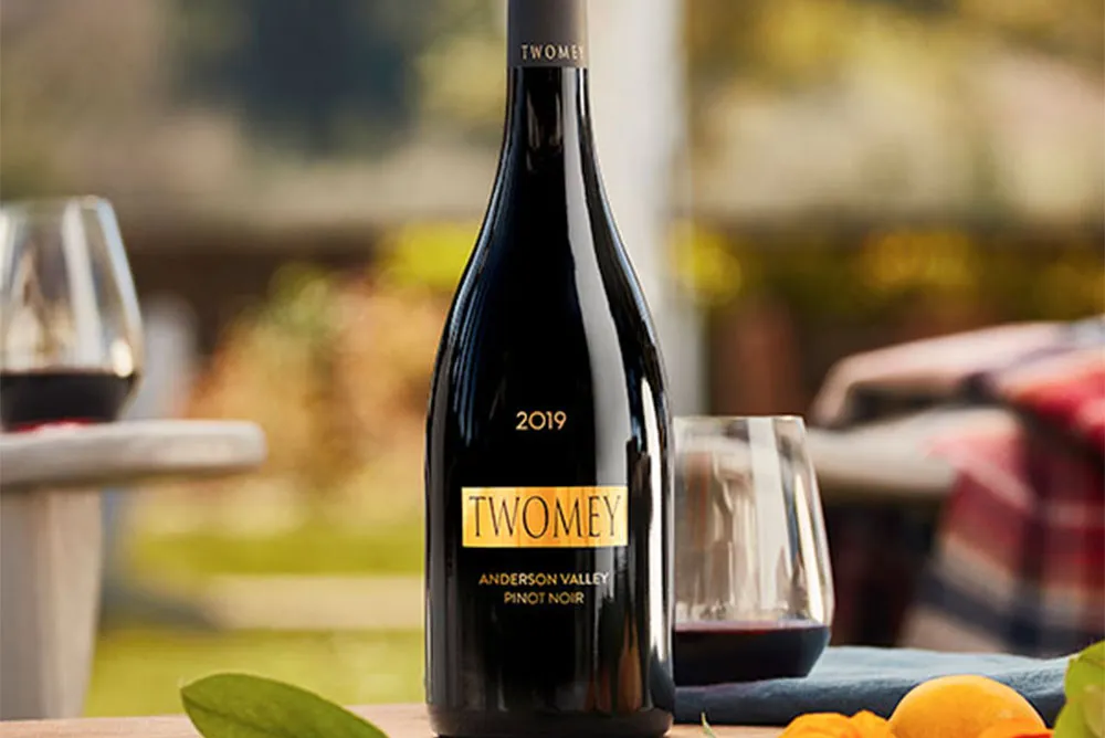 A bottle of Twomey Anderson Valley Pinot Noir on an outdoor table